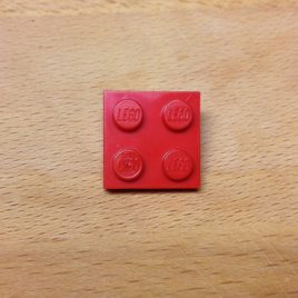 Broche rojo 2x2 de LEGO®